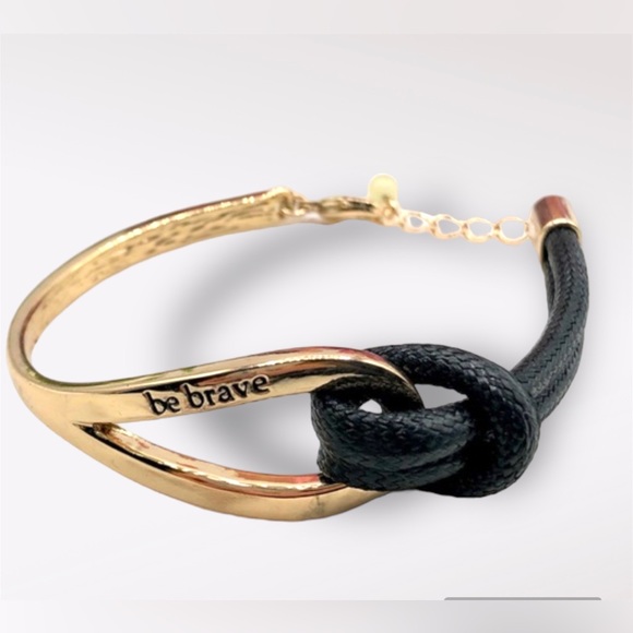 New in package Be Brave Gold Tone And Black
Knot Bracelet - Picture 3 of 6
